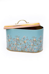 Mavi fonda floral desenli, pembe kapaklı ve altın saplı metal saklama kutusu