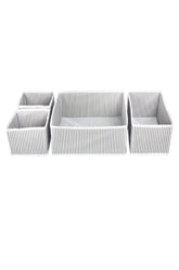 Gri beyaz çizgili dört farklı boyutta dikdörtgen saklama kutusu