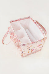 Pembe bebek bakım çantası, iç bölmeleri ve sevimli hayvan desenleriyle