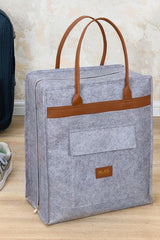 Gri keçe dokulu seyahat çantası, kahverengi deri kulplu, ön cepli, ALAS etiketli