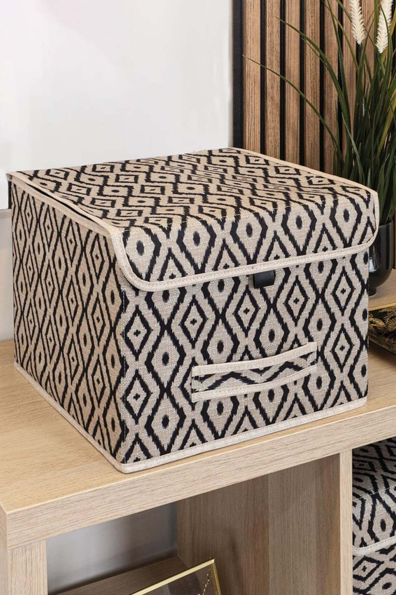 Siyah ve krem rengi geometrik desenli kapaklı dekoratif kumaş saklama kutusu